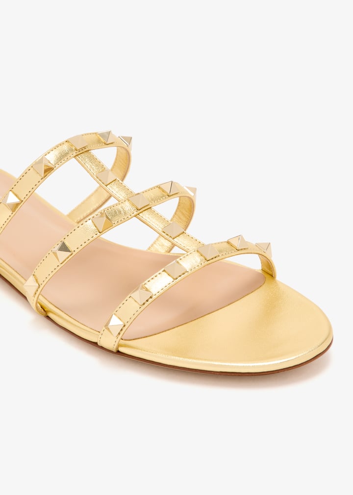 Valentino Garavani Rockstud flat sandals for Women - Gold in