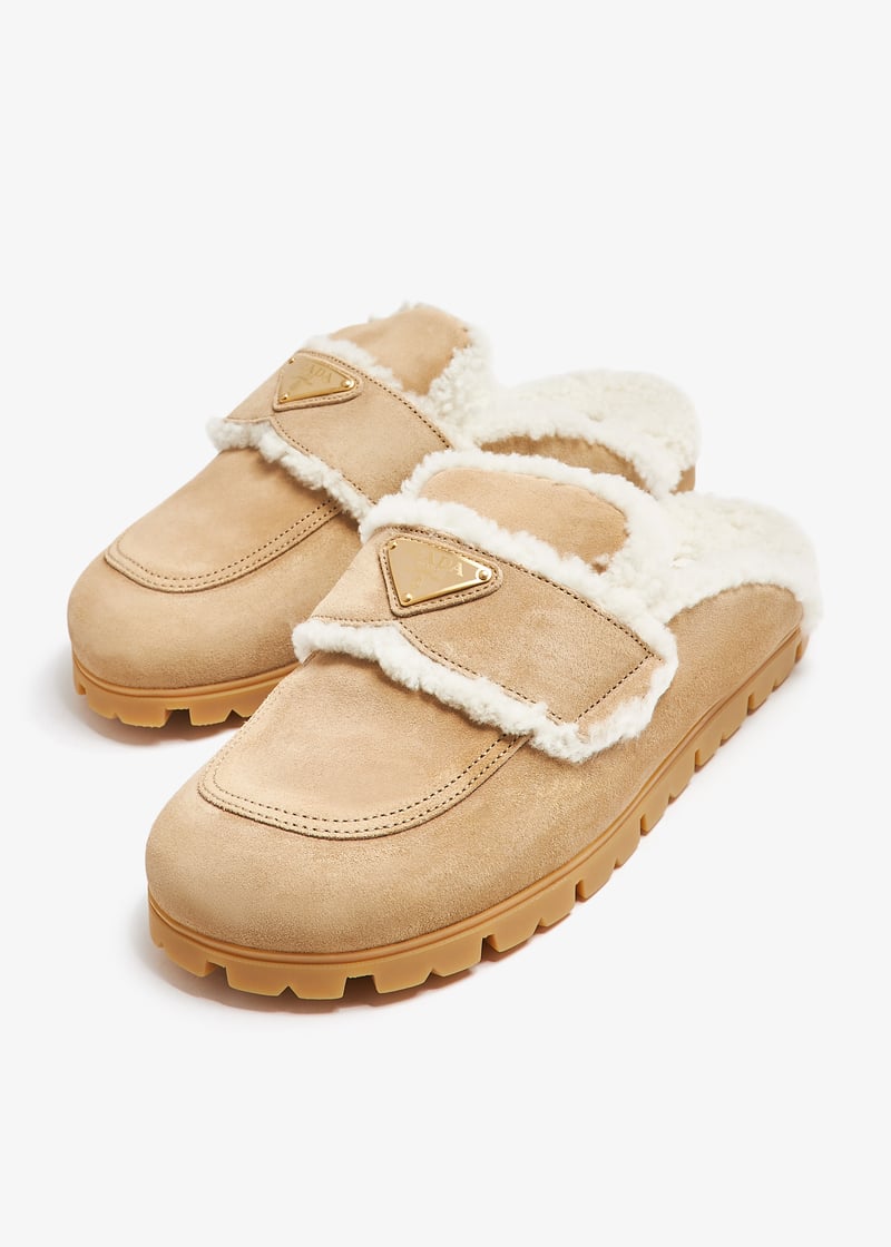 Prada Suede and shearling slippers for Women - Beige in UAE