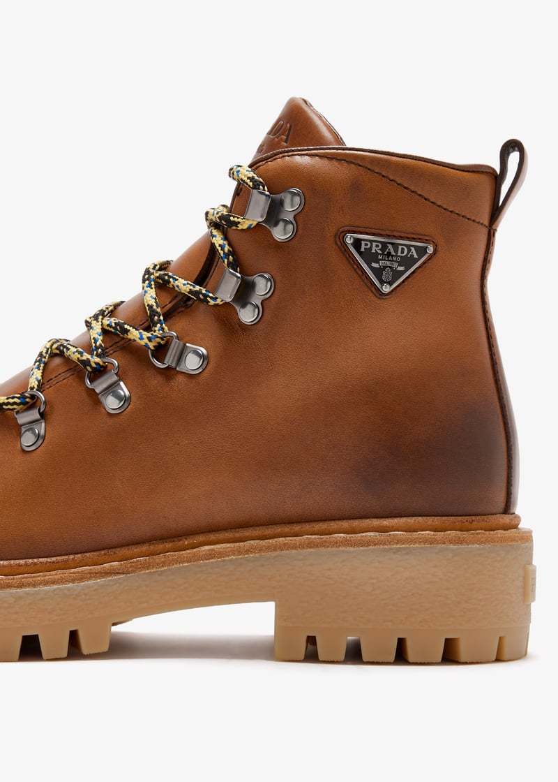 Prada Leather laced booties for Women - Brown in UAE | Level