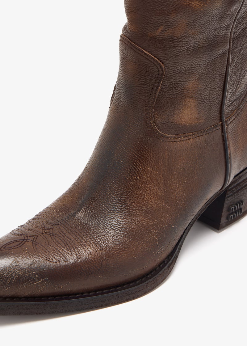Miu Miu Leather boots for Women - Brown in UAE | Level Shoes