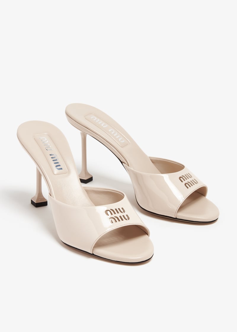 Miu Miu Patent leather mules for Women - Beige in UAE