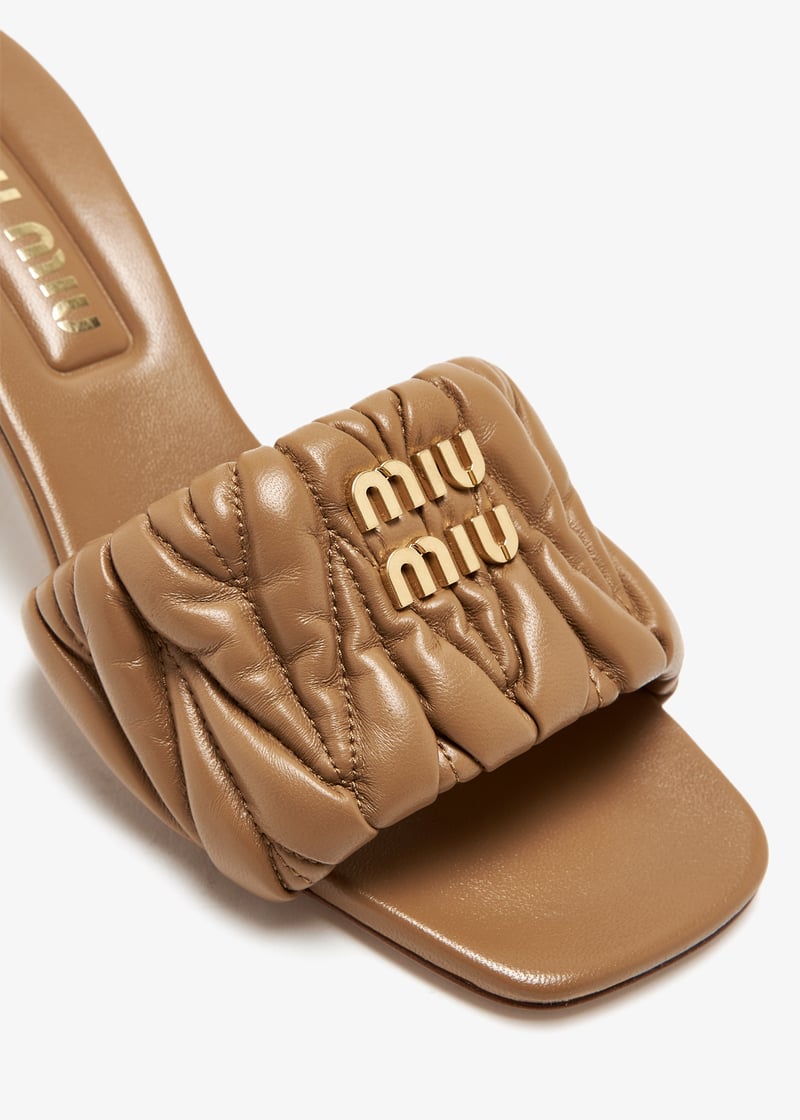 Miu Miu Matelassé nappa leather mule heels for Women - Beige