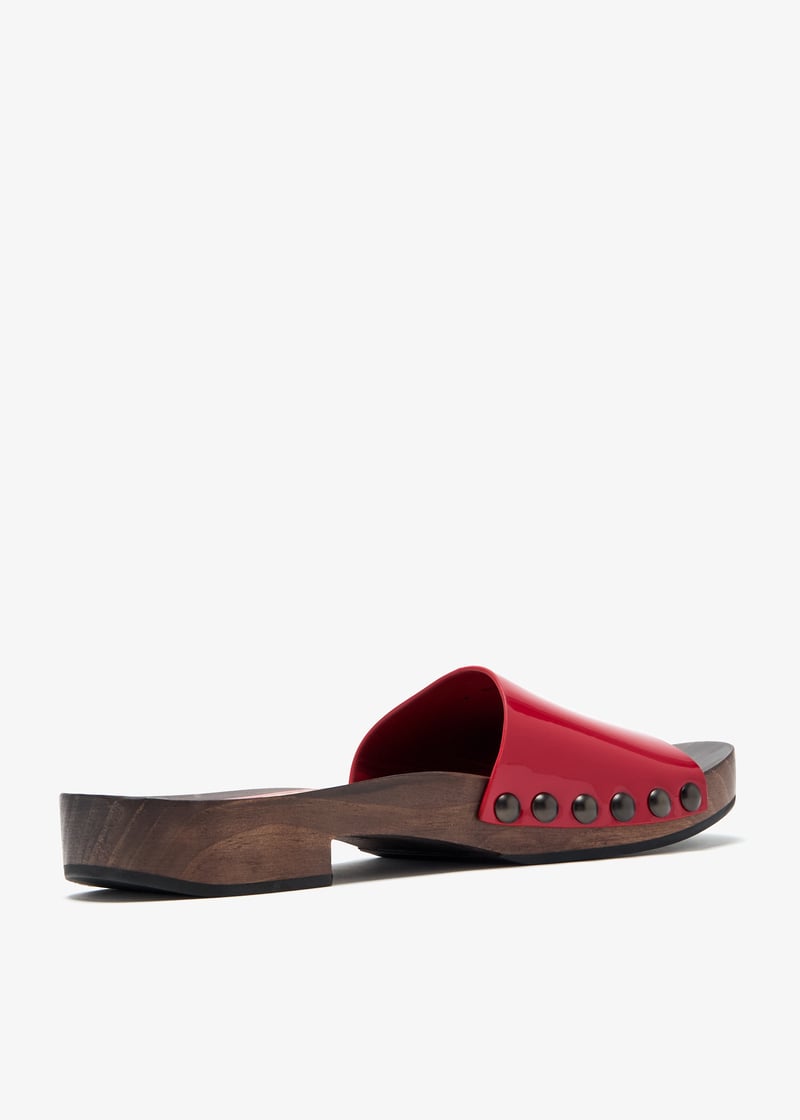 Miu Miu Patent leather clogs for Women - Red in UAE | Level