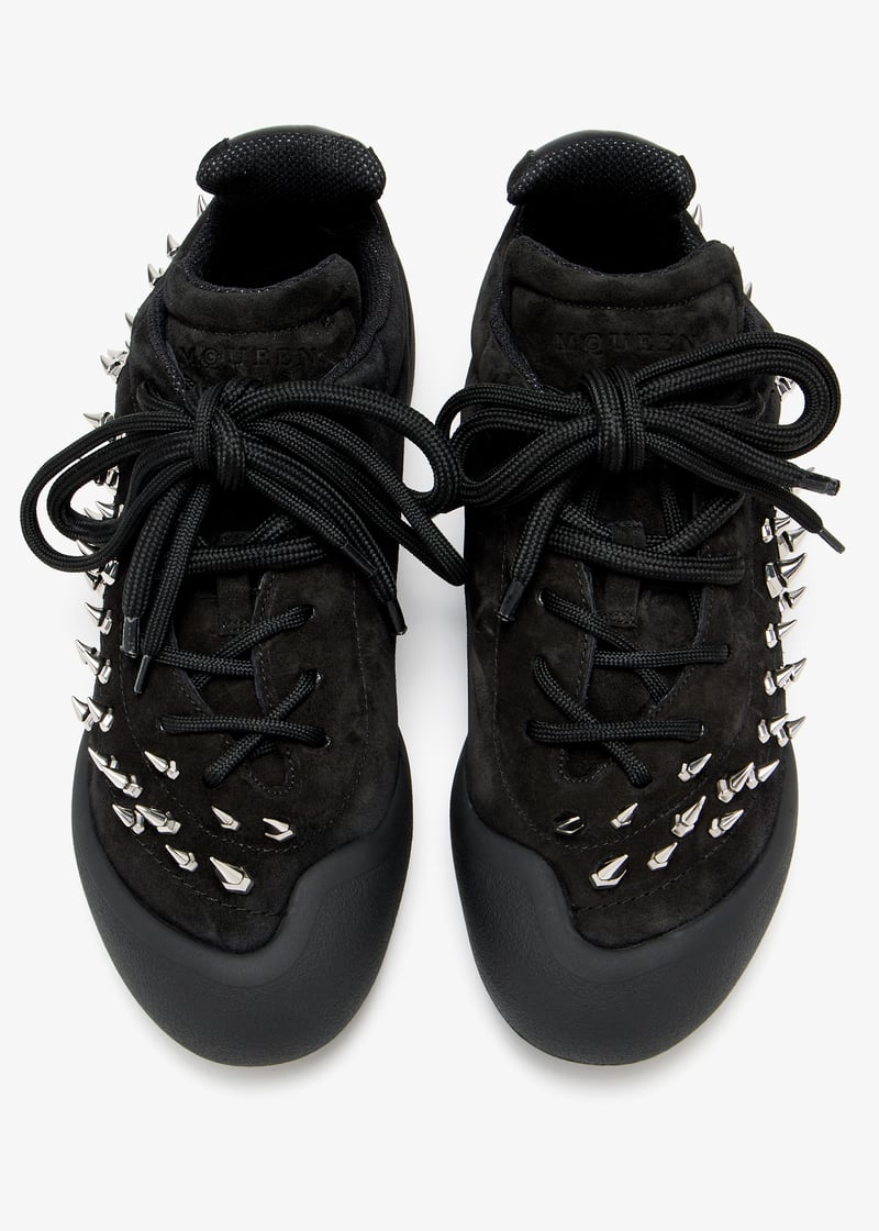 McQueen Flexion studded sneaker for Men - Black in Qatar