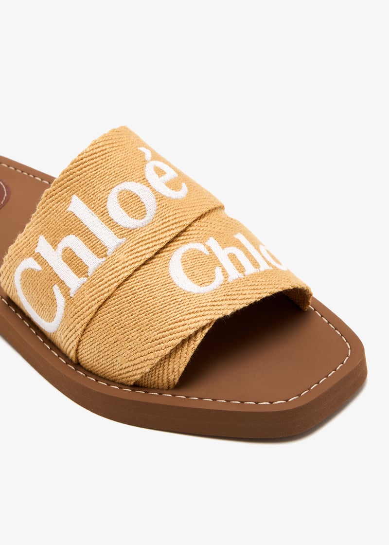 Chloé Woody flat sandals for Women - Yellow in UAE | Level Shoes