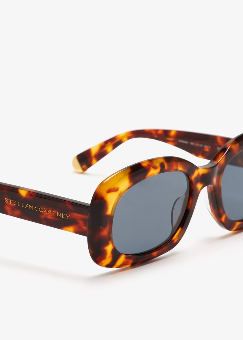 Stella McCartney Medallion oval sunglasses for Women - Brown